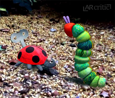 Caterpillar playing with a ladybug