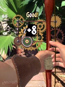 Bow and arrow and a target moving on clockworks rails